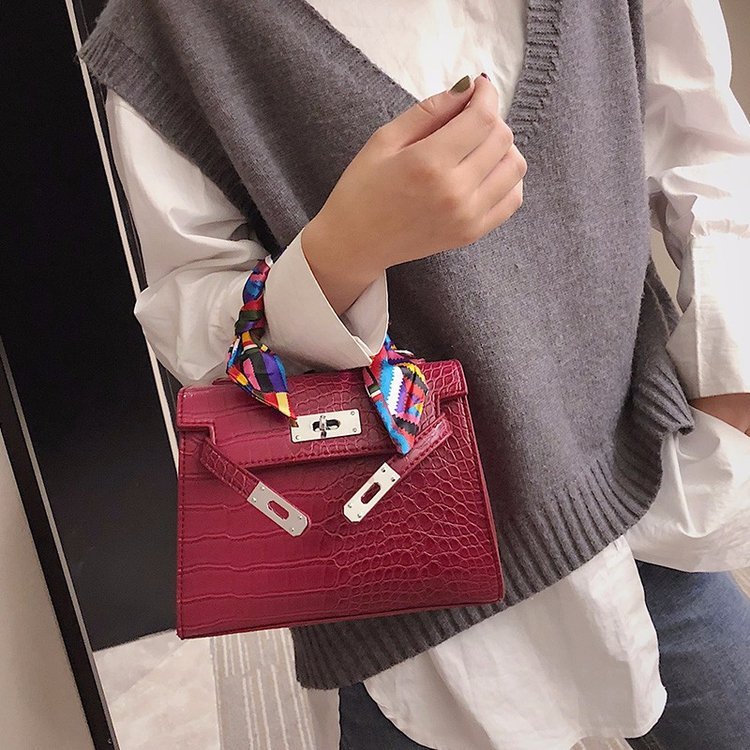 A Cross-Body Bag with a Stone Design