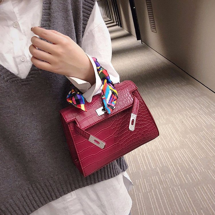 A Cross-Body Bag with a Stone Design