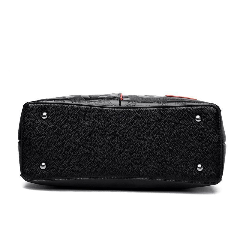 A Versatile Monogrammed Shoulder Bag For Women