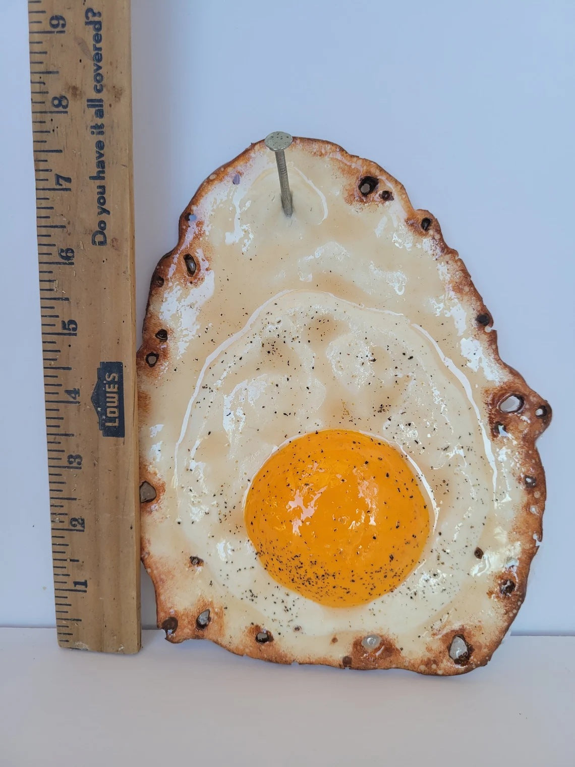 A Fried Egg Hanging On A Nail Sculpture Home Decoration